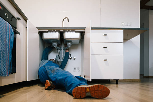 Professional Emergency Plumber technician working in Trimble, OH
